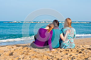 Three girls sitting