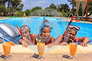 Three girls in the swimming pool