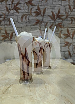 Three glasses of Chocolate Sharja With ice-cream photo