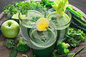 Three glasses of fresh green juice