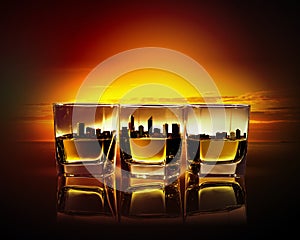 Three glasses of whiskey