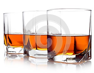 Three glasses of whiskey