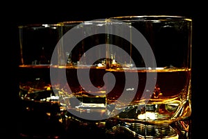Three glasses of whiskey