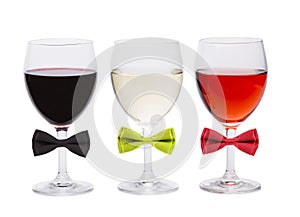 Three glasses of wine and bow tie.