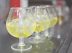 Three glasses with hierbas liquor photo