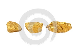The Three gold nuggets isolated on white