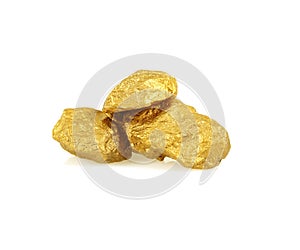 The Three gold nuggets isolated on white