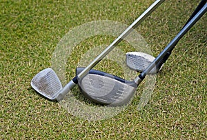 Three golf clubs on the grass, Rio photo