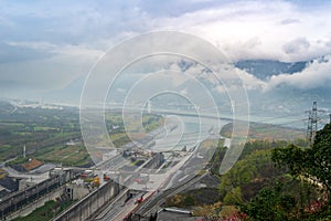 The Three Gorges Dam shrouded in mist.