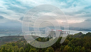 The Three Gorges Dam shrouded in mist.