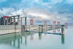 The Three Gorges Dam shrouded in mist.