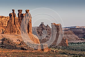 Three Gossips Rock Formation in Arches National Park at Sunrise photo