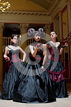 Three gothic girls with horns