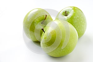 Three green apples