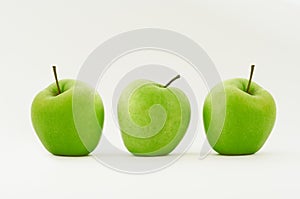 Three green apples