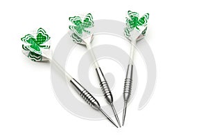 Three green darts isolated