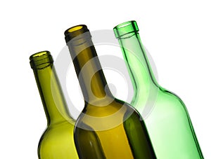 Three green empty bottles