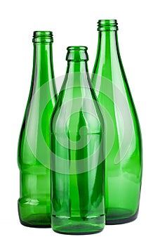 Three green empty bottles