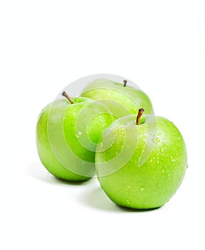 Three green granny smith apples