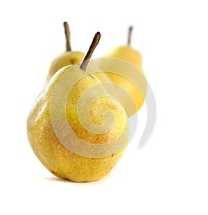 Three green pears isolated on white