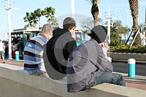 Three Guys on a Wall