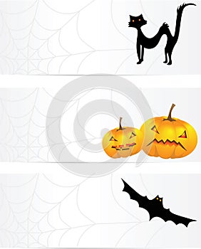 Three halloween banners with a cobweb