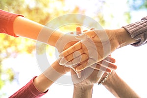 Three hand holding together unity,business teamwork,friendship,concept background
