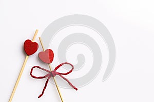 Three handmade heart cupcake toppers on white background photo