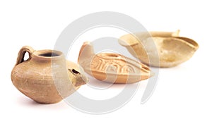 Three Handmade Oil Lamps Isolated on a White Background