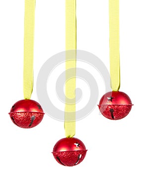 Three hanging Christmas or holiday ornaments