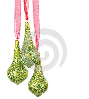 Three hanging Christmas or holiday ornaments