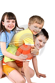 Three happy children playing