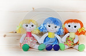 Three happy rag dolls