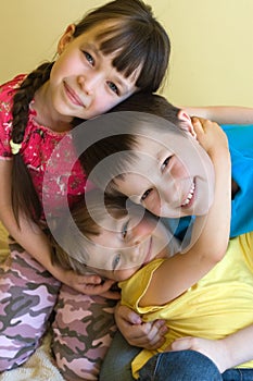 Three happy young children photo