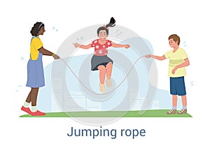 Three happy young children playing with a skipping rope