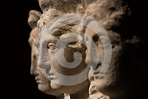 Three headed roman-asian ancient statue of beautiful women