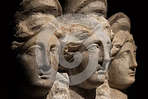 Three headed roman-asian ancient statue of beautiful women, Goddess Hekate, black isolated