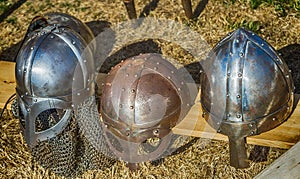 Three helmets with nose protection as worn by medieval knights in the Middle Ages