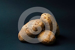 Three High Res Potato on Black Background