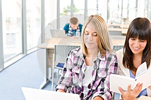 Three high school students in classroom