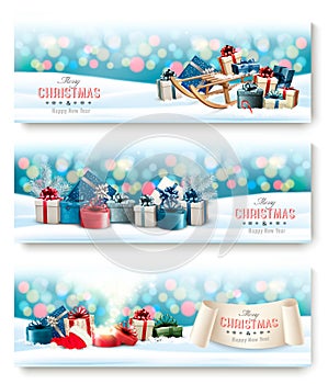Three Holiday Christmas banners with presents and magic box.