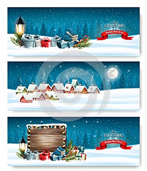 Three Holiday Christmas banners with a winter village