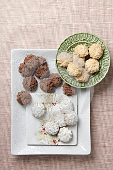 Three holiday cookie groups plated from overhead