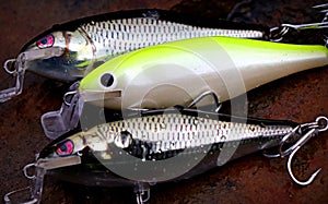 Three home-made fishing lures plugs minnows