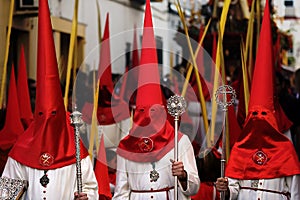 Three Hooded Sinners in Catholic Parade