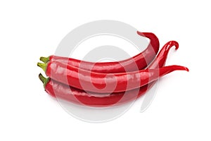Three hot chili peppers isolated on white background