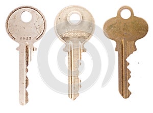 Three house keys on white