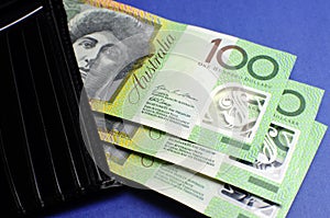 Three hundred Australian dollar notes with wallet