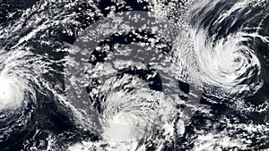 Three Hurricanes, Storms tornado, satellite view. Some elements of this video furnished by NASA.