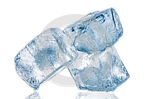 Three ice cubes close up on white background